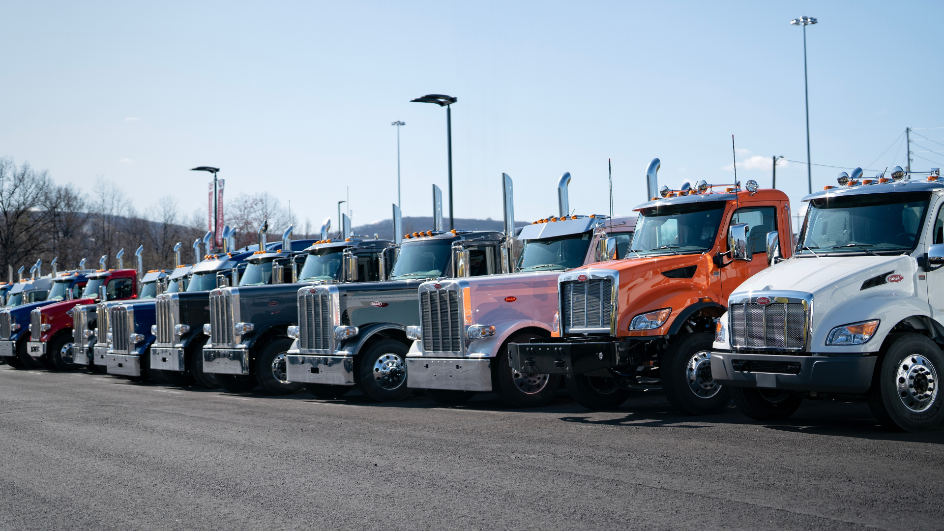 Line up of Peterbilt trucks for sale at hunter truck